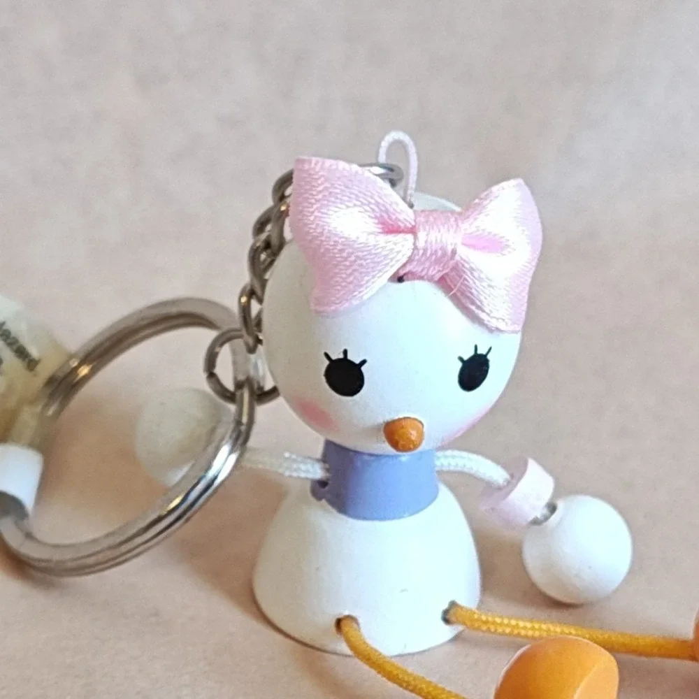 Disney Daisy Duck Keychain White Pink Wooden Figural Dangling Legs